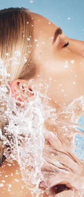 Woman_with_hydrated_skin_water_splashing_on_face